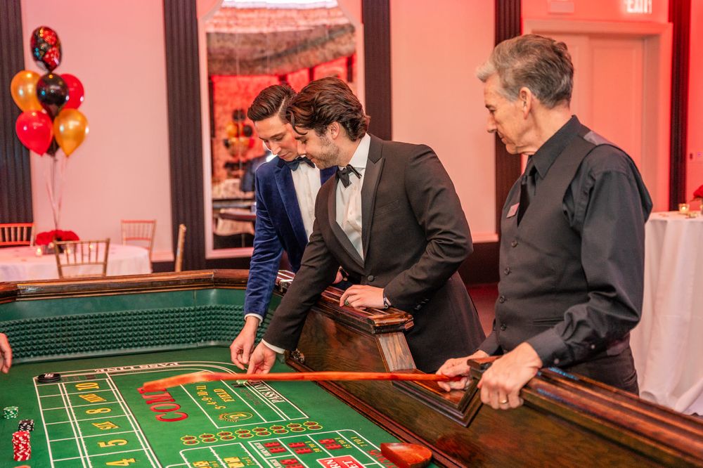 Guests at the craps table during a casino night event