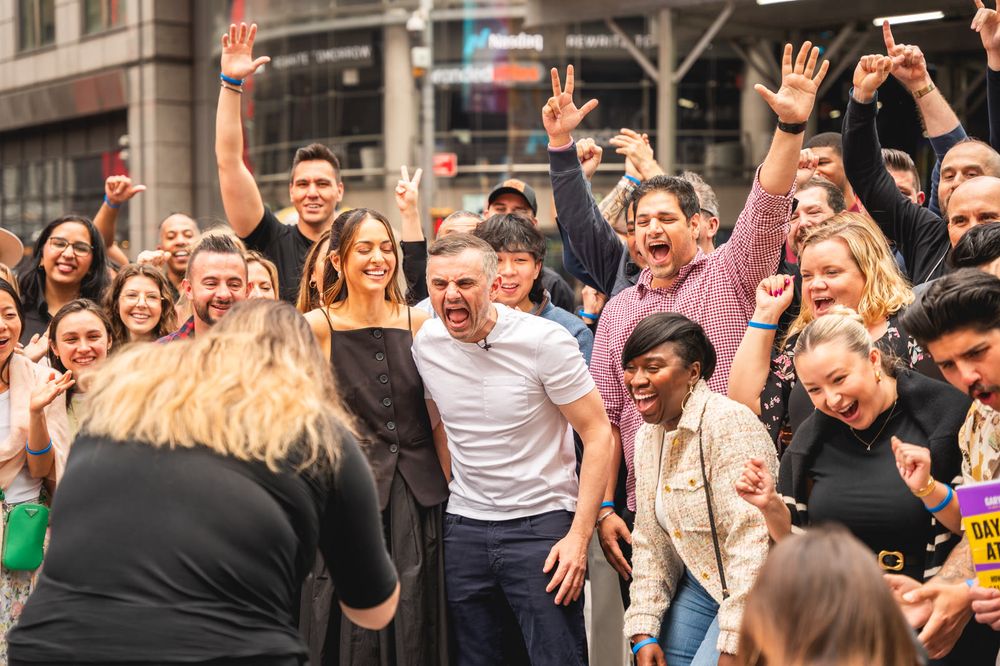Crowd celebrating at a Nasdaq event